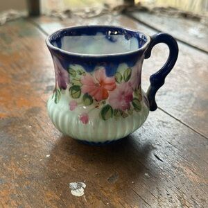 Floral Ceramic Mug with Blue Handle